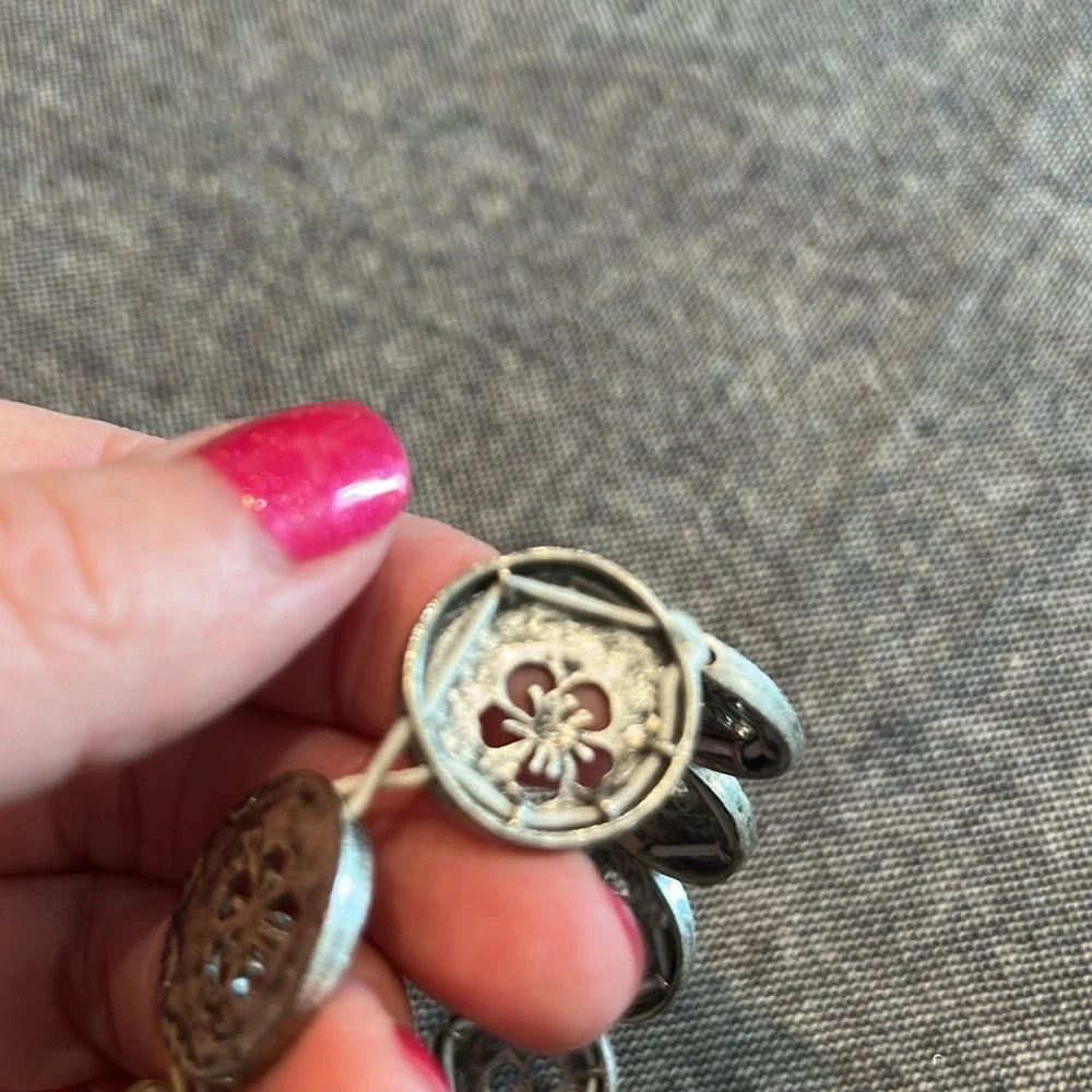 Silver medallions with floral motif bracelet